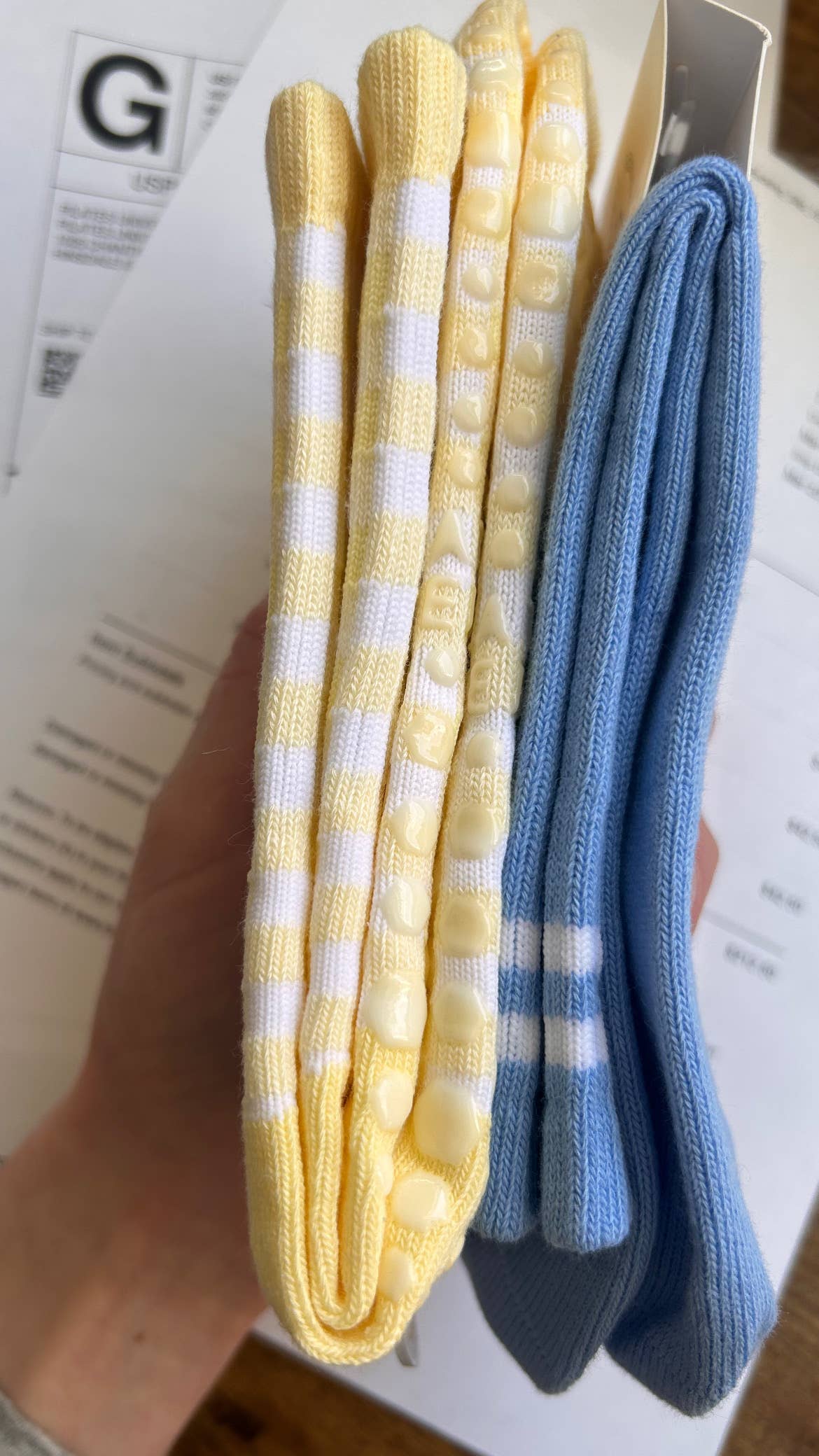 Side view of the Martha's Vineyard Yellow grip socks highlighting the crew-length silhouette, gingham knit pattern, and silicone grip placement on the sole.