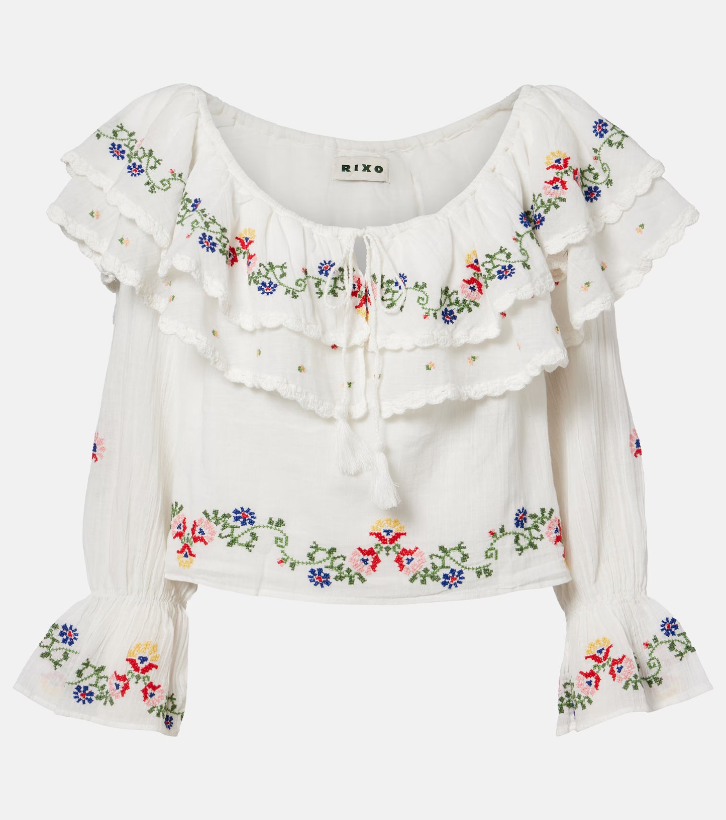 Front view of the Maurine boho top with colorful floral embroidery, ruffled off-shoulder neckline, and long sleeves
