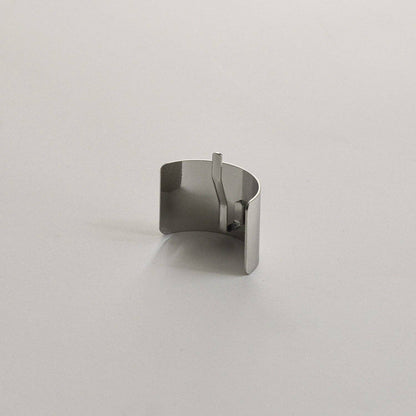 Back view of the silver rectangular metal ponytail cuff stick showing the built-in fastening stick.