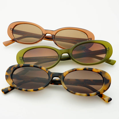 Assorted Mimi acetate oval sunglasses displayed in tortoise, olive, and neutral colorways.