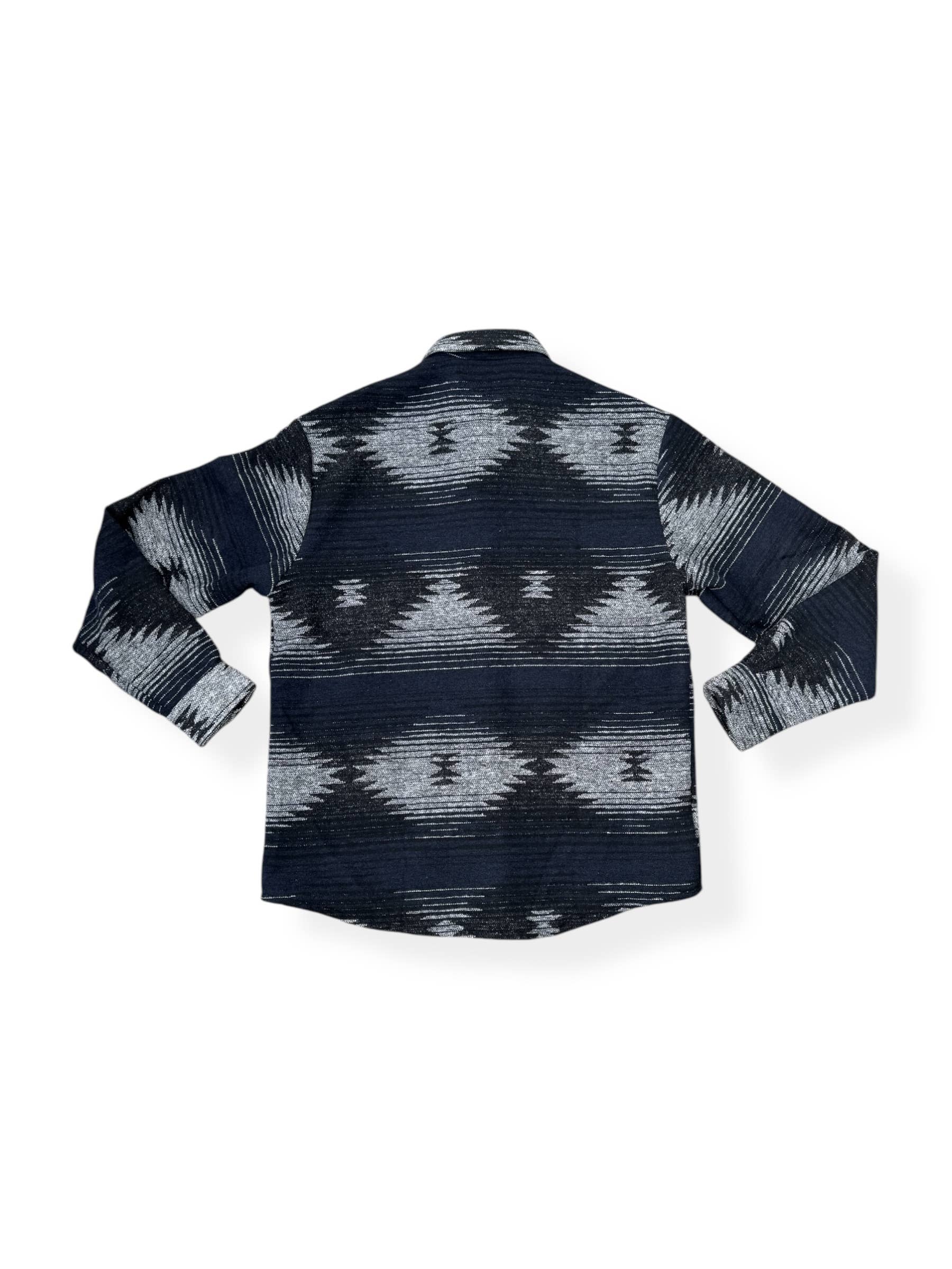 Back view of the Moab Mid-Weight Button Down featuring a black and blue Aztec pattern in a soft poly wool blend.