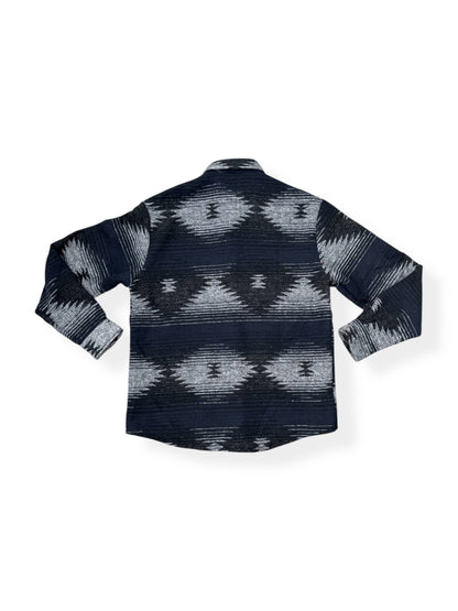 Back view of the Moab Mid-Weight Button Down featuring a black and blue Aztec pattern in a soft poly wool blend.