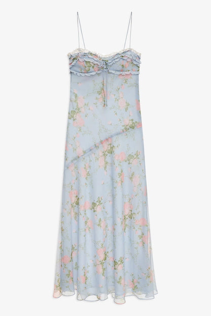 Front view of the Natalie Maxi Dress in dusty blue with soft pink floral print, delicate ruffle trim, lace neckline, and flowing maxi silhouette.