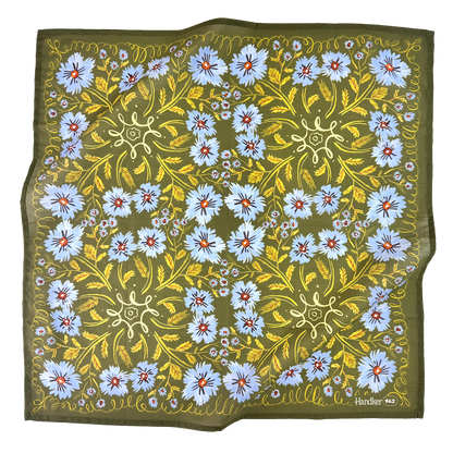 Full view of the No. 143 Clara bandana in olive green with periwinkle floral print, yellow botanical accents, and decorative border.