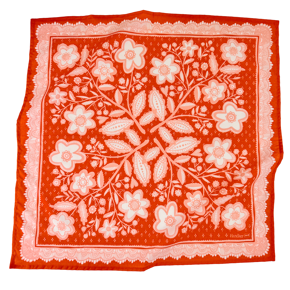 Red-orange and pink Lacey Bandana laid flat, featuring an intricate floral pattern and decorative border.