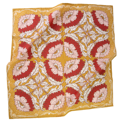 No. 154 Ruthie Bandana laid flat featuring an ochre gold, pink, brown, and cream floral print.