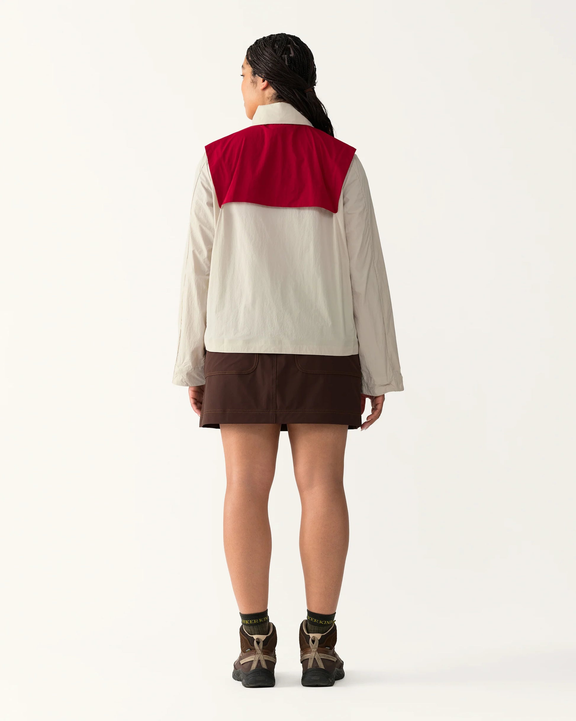 Back view of Packable Windbreaker in Dolomite/Rowan with contrast panel across shoulders