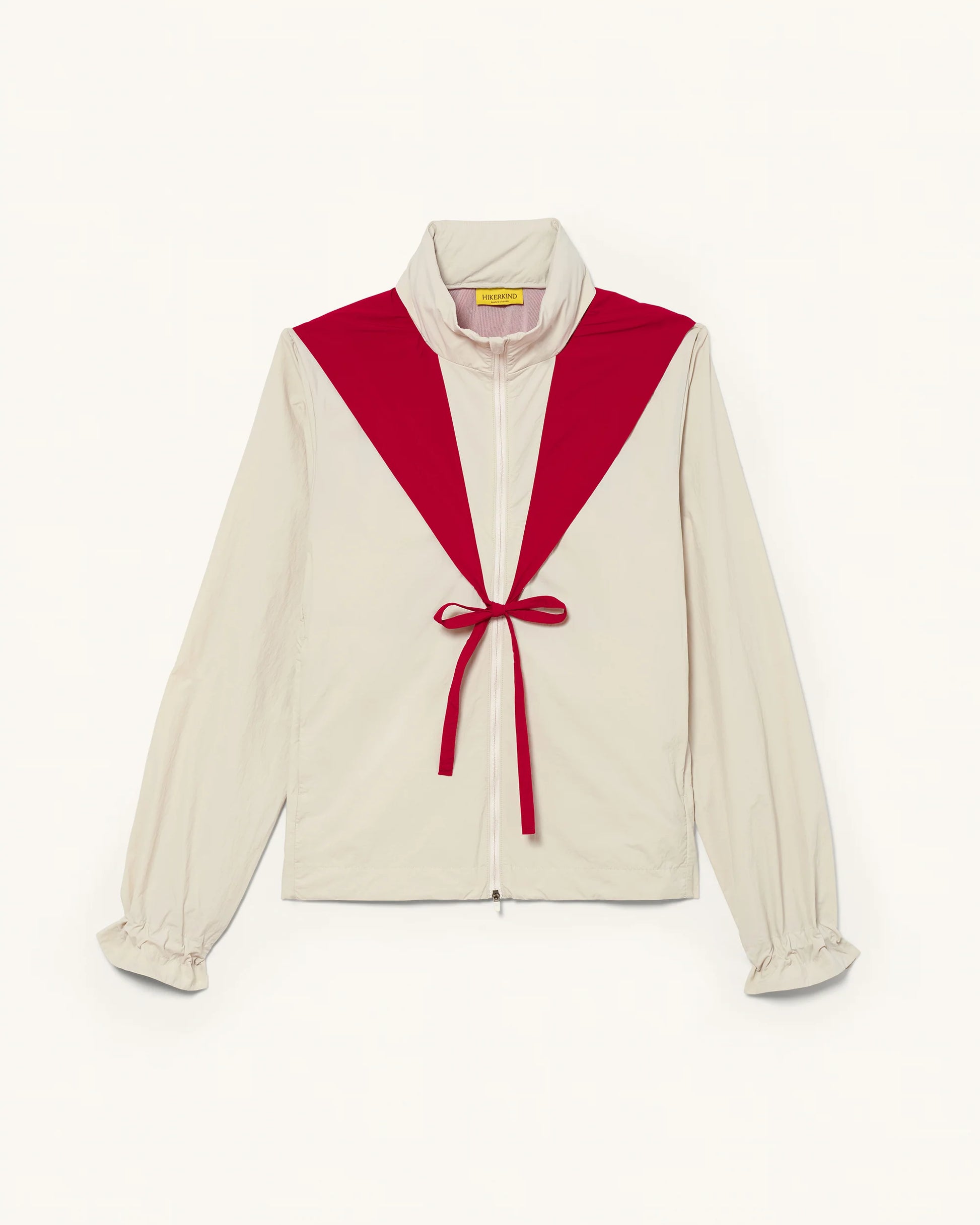 Front view of Packable Windbreaker in Dolomite/Rowan with contrast panel and front tie detail