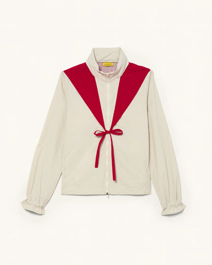 Front view of Packable Windbreaker in Dolomite/Rowan with contrast panel and front tie detail