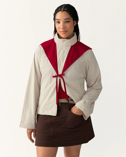 Packable Windbreaker in Dolomite/Rowan worn open showing two-way zipper and layered styling