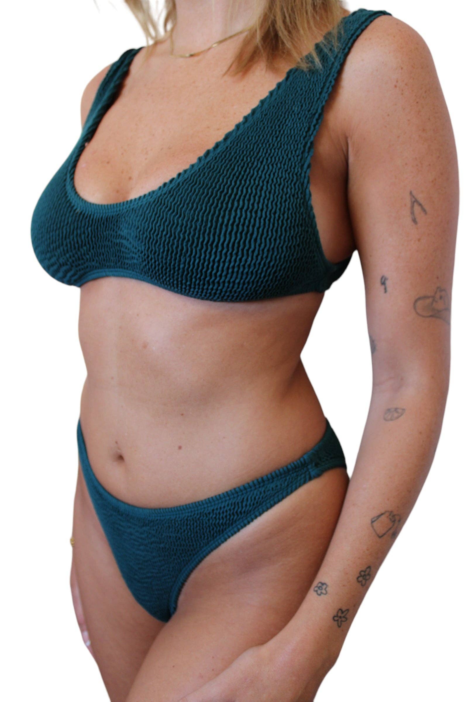 Close front view of the Paige Top in Mermaid showing the ribbed texture, v-cut neckline, and comfortable swim fit.