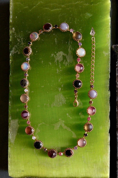 Paint Pot Layering Choker in Punk Rocks Gold featuring multicolor round vintage glass stones and crystal accents with a gold-plated extender chain.