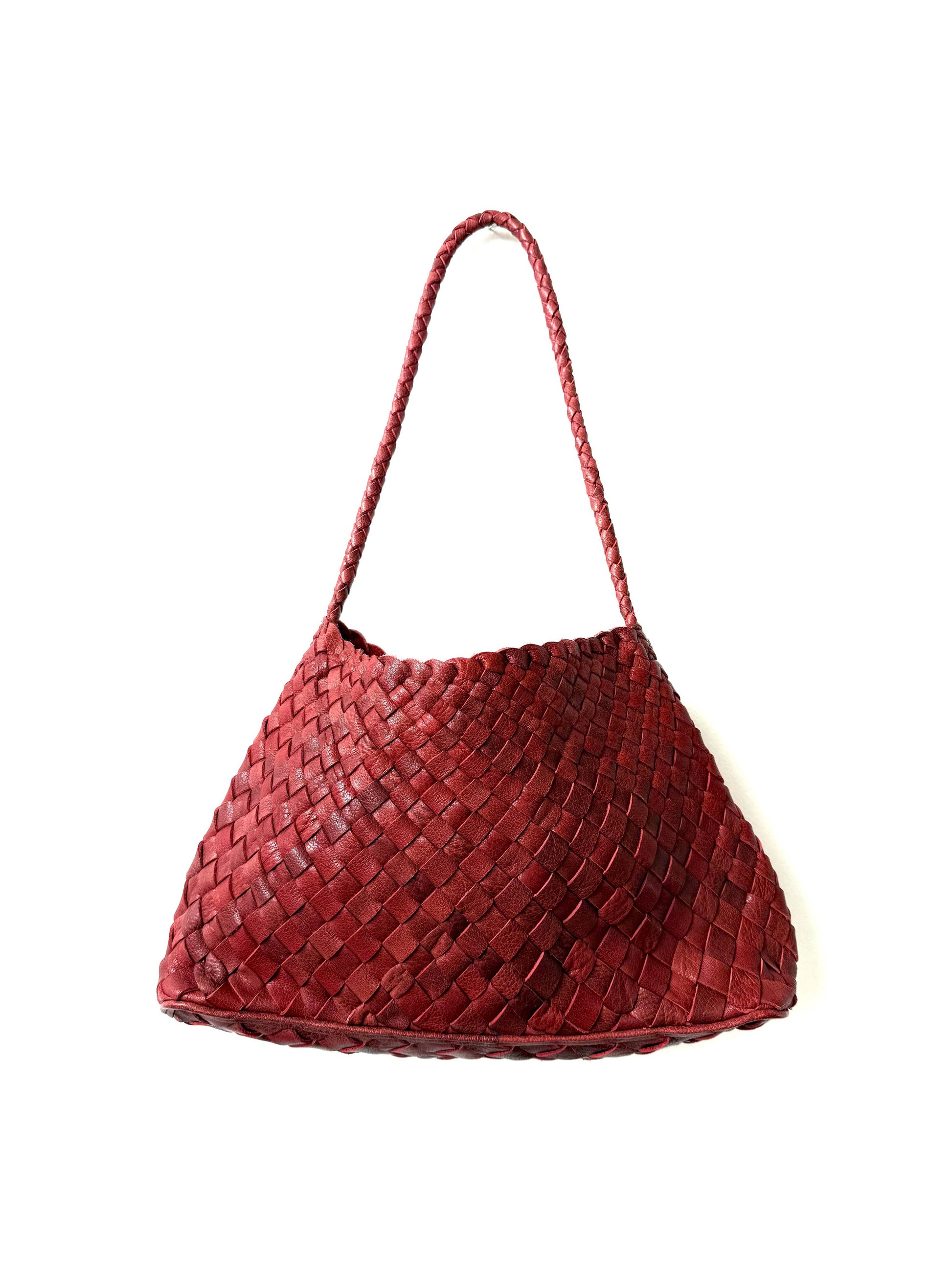 Palar Red Bag in handwoven red leather on a white background