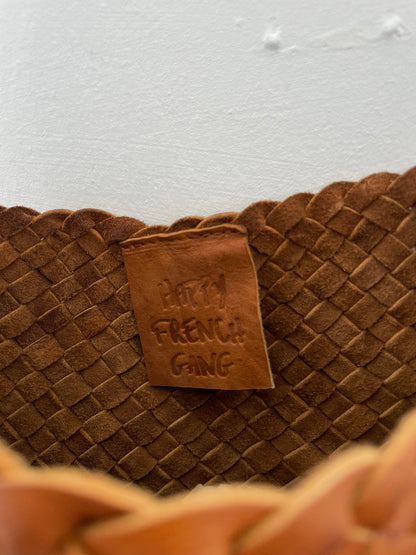 Close-up of the interior leather label and handwoven construction of the Palar Tan Bag