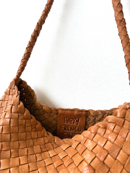 Close-up of the Palar Tan Bag open top, woven leather and interior brand label