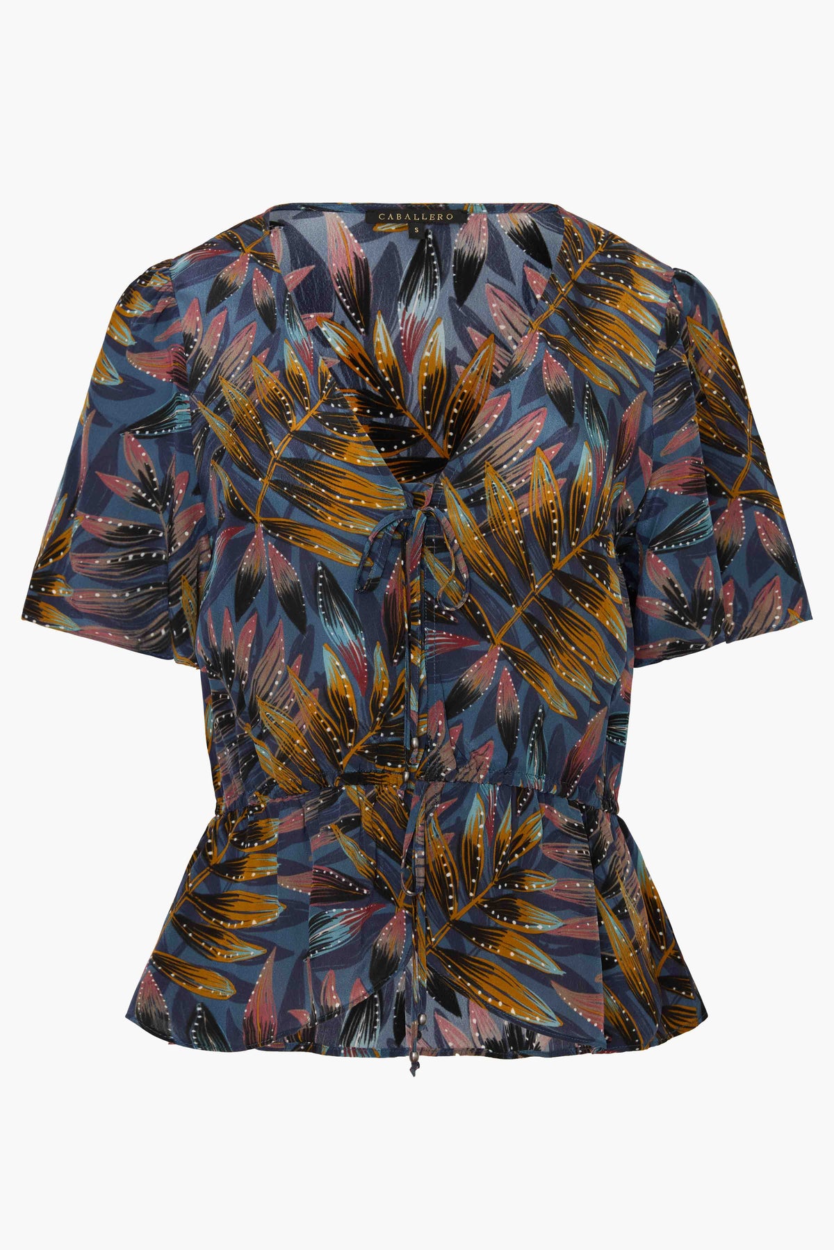 Front product view of the Rhea Top in Midnight Palm with a V-neckline, tie detail, short sleeves, and peplum hem.