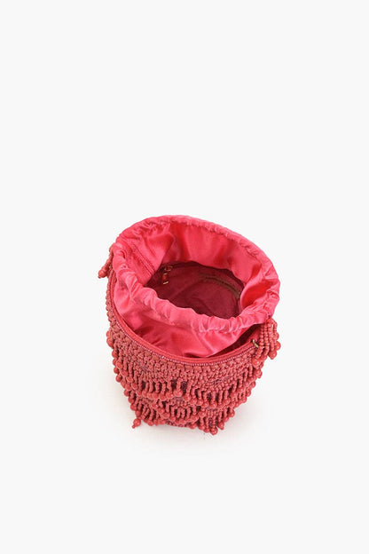 Top view of the Rose Eden Bucket Bag showing the drawstring closure, pink satin lining, and lined interior.