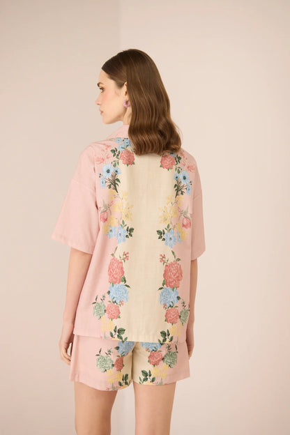 Back view of the Shea Shorts in a blush and cream floral print, styled with the matching Shea Shirt.