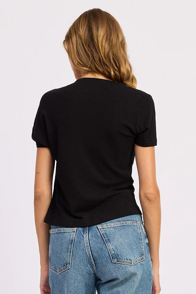 Back view of the black Sloane Short Sleeve Shirt featuring short sleeves and a relaxed silhouette.