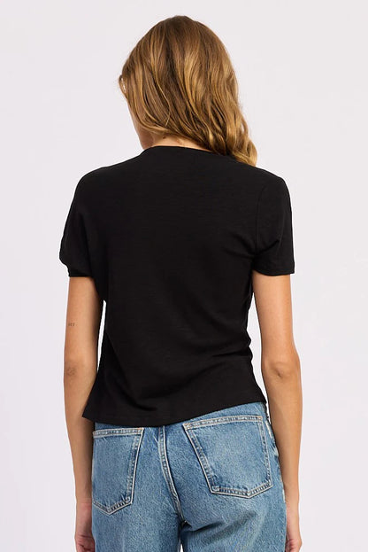 Back view of the black Sloane Short Sleeve Shirt featuring short sleeves and a relaxed silhouette.