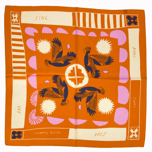 Soar & Sing 100% silk Habotai scarf in a 26 inch square with illustrated birds, floral motifs, and warm orange tones.