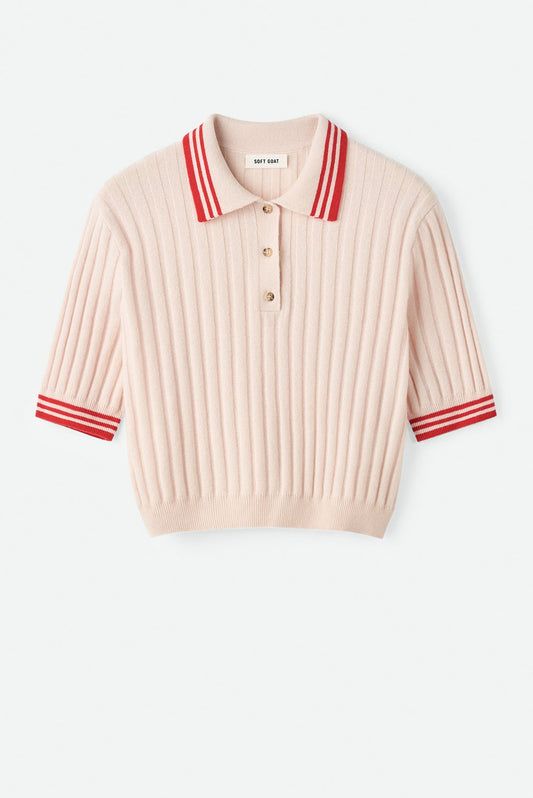 Flat lay image of the blush pink Striped Pique cashmere polo with ribbed texture and red striped collar and sleeve cuffs on a neutral background.