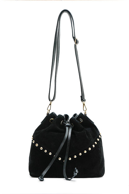 Front view of the Régine Suede Bag in noir suede with gold-tone studs, drawstring closure, and adjustable shoulder strap.