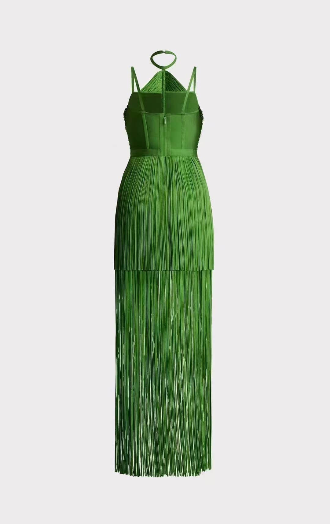 Front view of the Sultry Green Fringe Halter Maxi Dress in emerald green featuring layered fringe detailing, halter neckline, and flowing maxi-length silhouette.