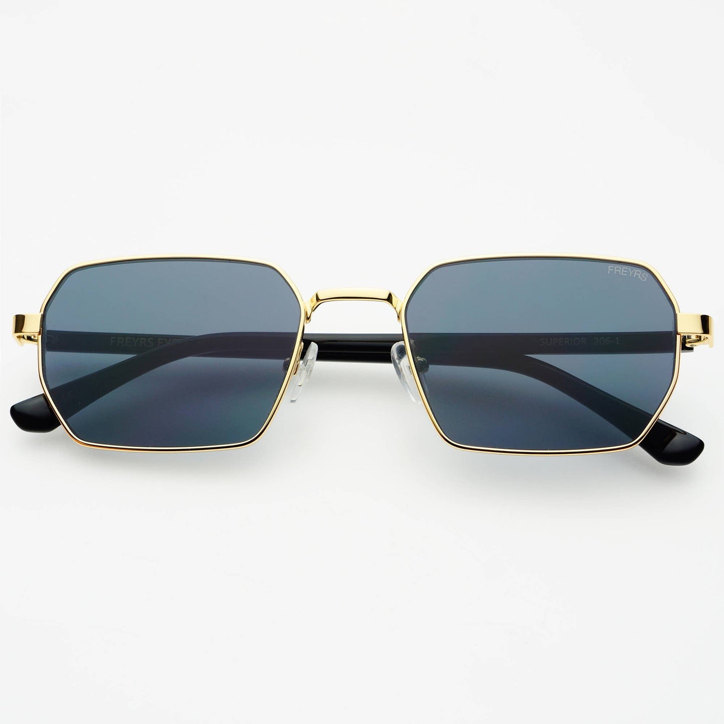 Front view of Superior unisex sunglasses featuring a gold stainless steel frame and gray lenses.