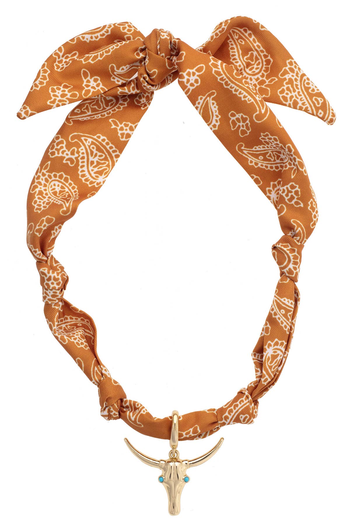 Burnt orange bandana scarf necklace with white paisley print and shiny gold steer skull pendant.