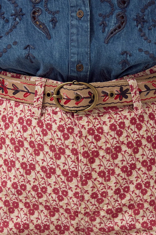 Thar Belt - Karma Thread styled at the waist with a denim top and red floral skirt.