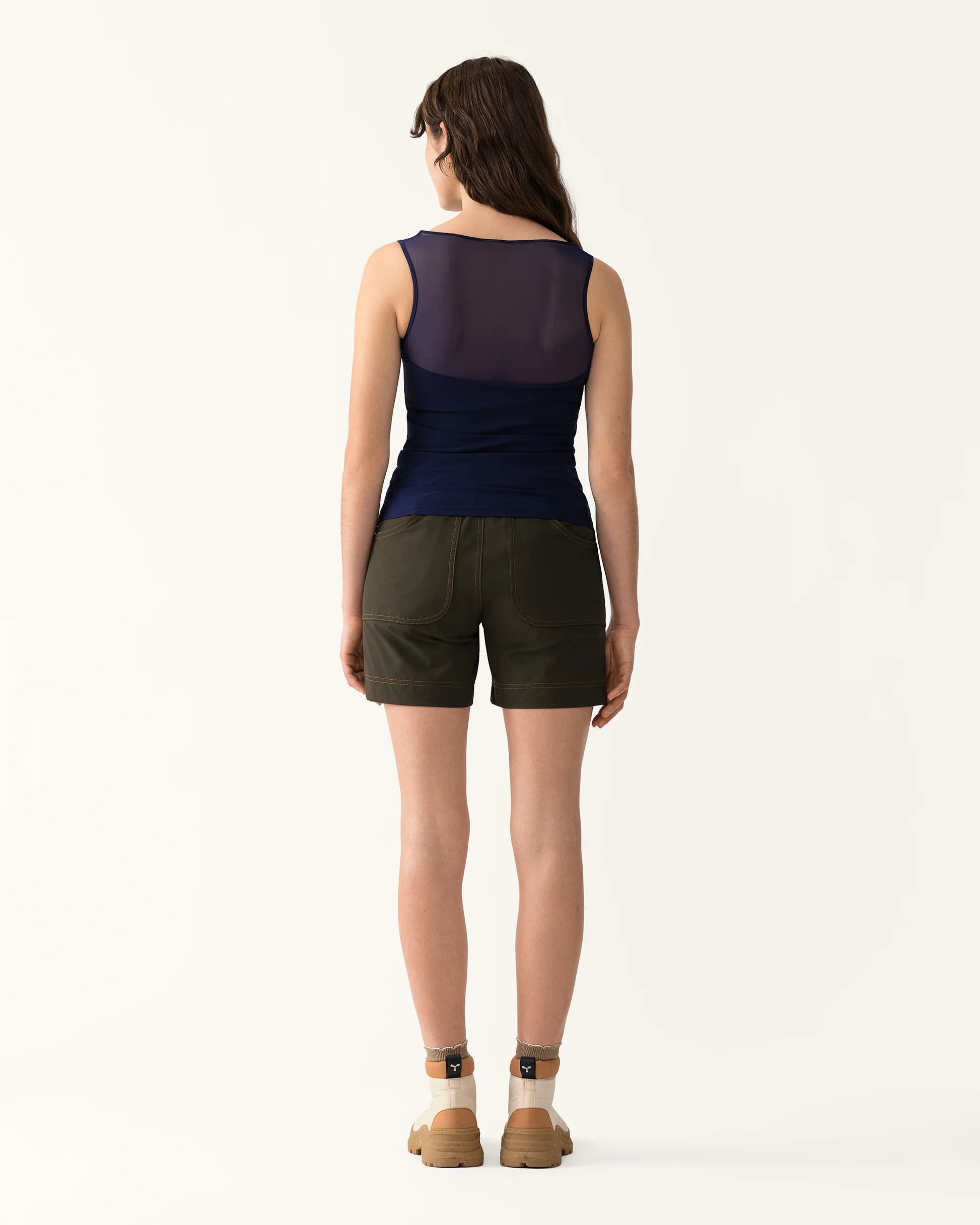 Back view of Trail Tank in Woad showing sheer mesh panel and streamlined fit