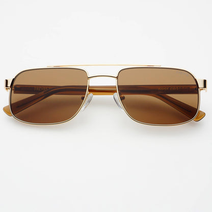 Front view of Vesper sunglasses featuring a gold-tone stainless steel frame and brown nylon lenses.