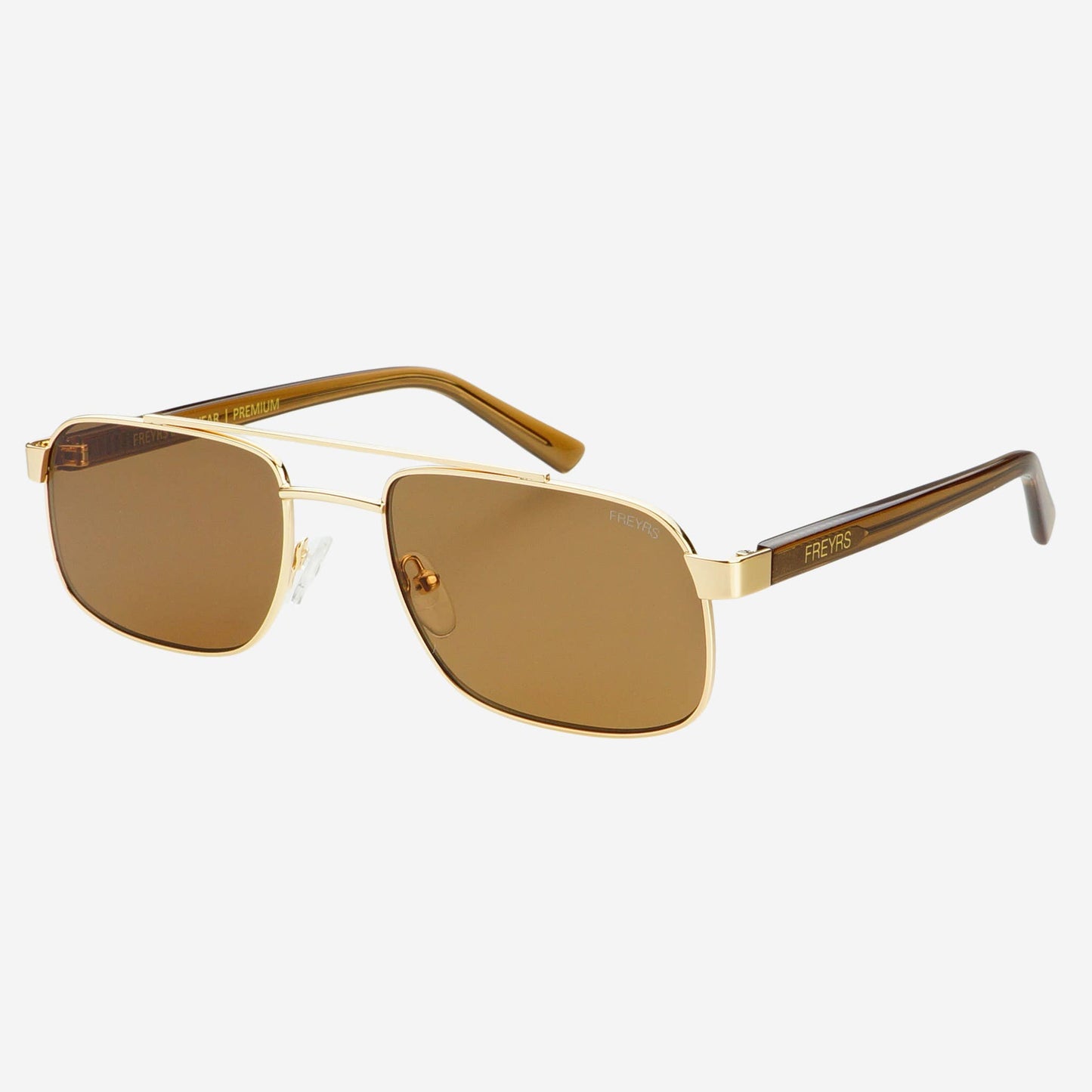Vesper sunglasses with gold-tone stainless steel frame, brown nylon lenses, and tortoise temples shown in an angled front view.
