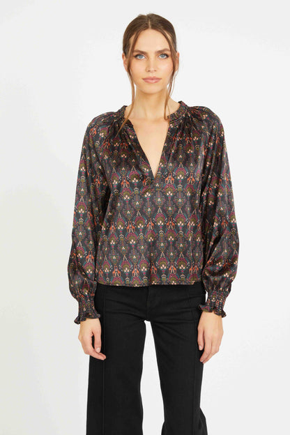 Close-up front portrait of the Vickie Top featuring a rich bohemian medallion print, satin sheen, gathered neckline, and relaxed long sleeves.