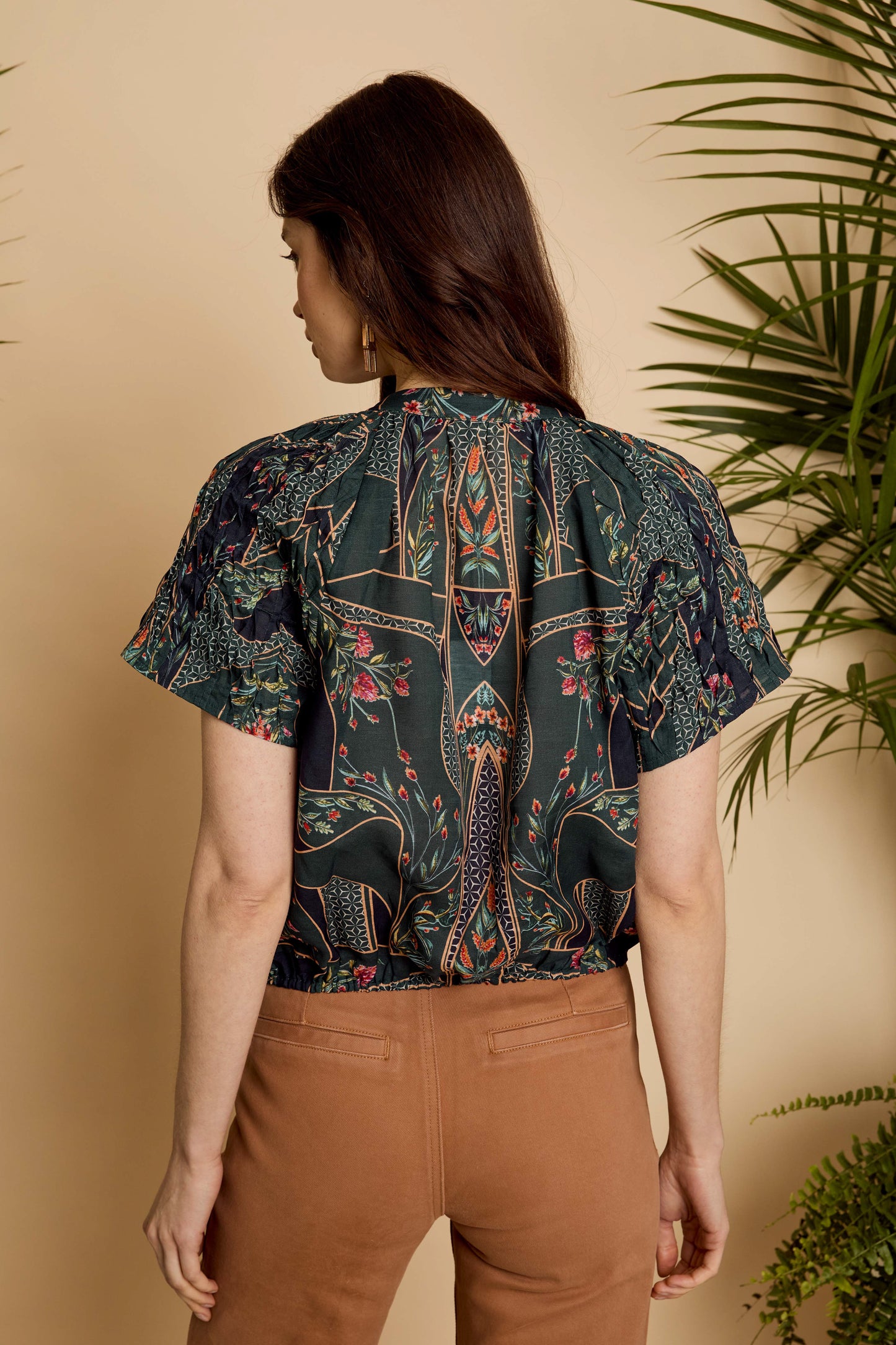 Back view of the Zola Top in Patchwork Flower showing the relaxed silhouette and patchwork floral print