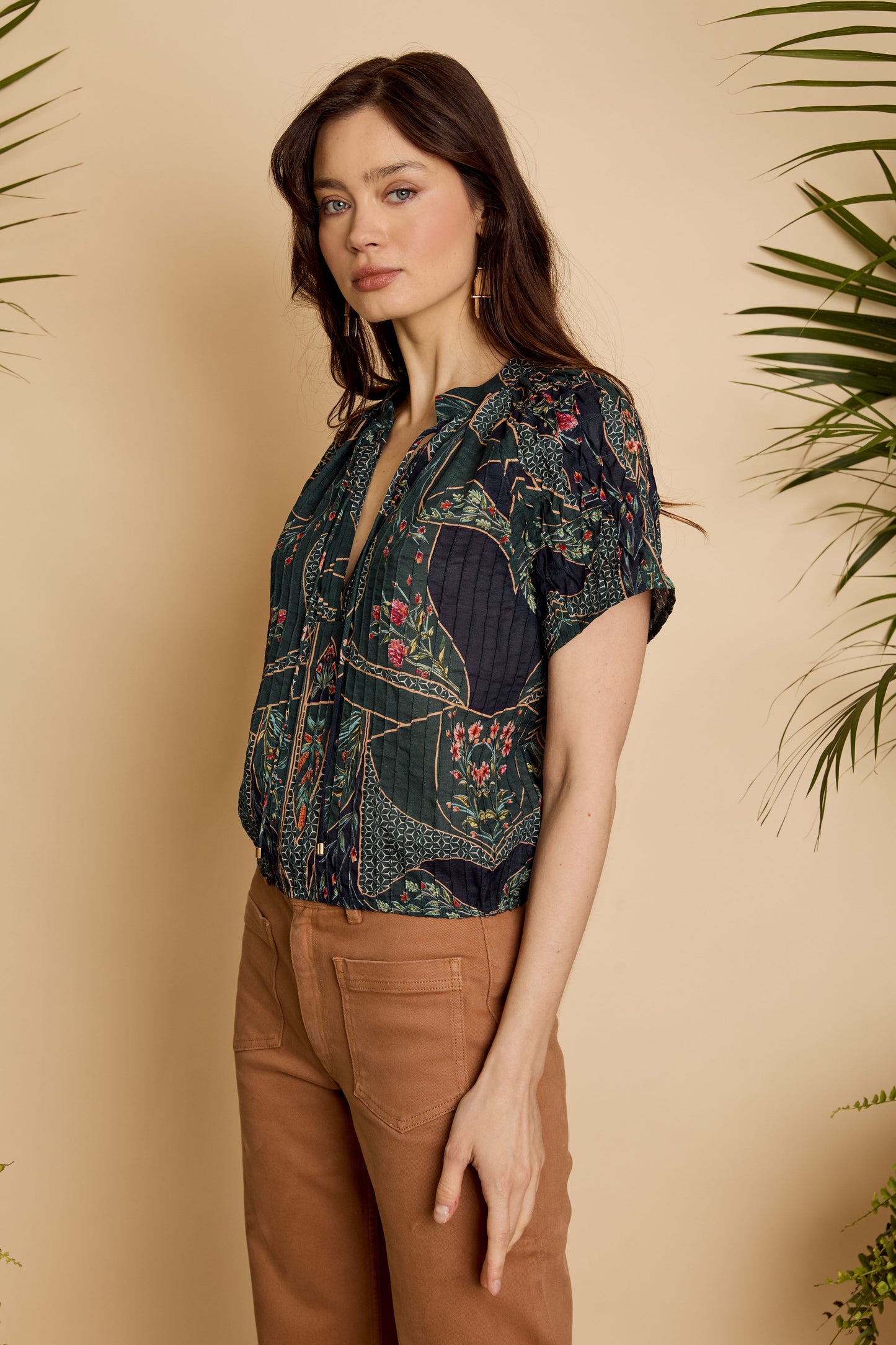 Side view of the Zola Top in Patchwork Flower showing the relaxed fit and draped silhouette