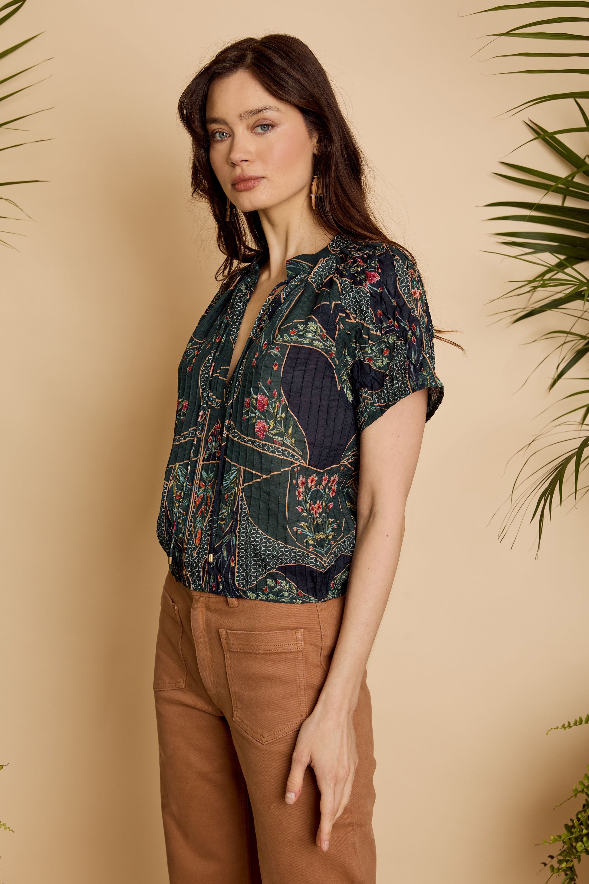 Side view of the Zola Top in Patchwork Flower showing the relaxed fit and draped silhouette