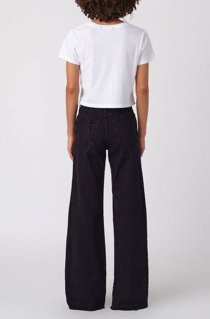Woman wearing the Little Rowdy Frida Wide Leg Jean in Black Oak, back view